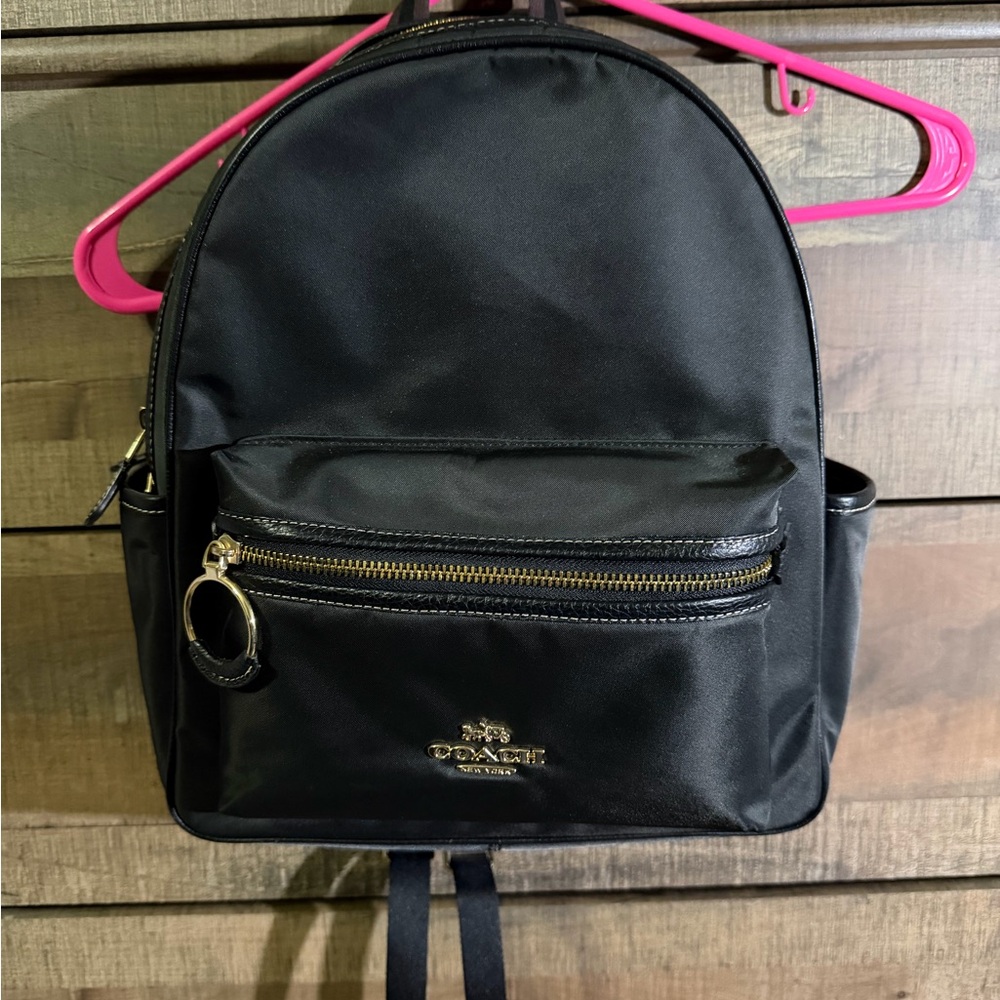 Coach Black Backpack with gold Accents